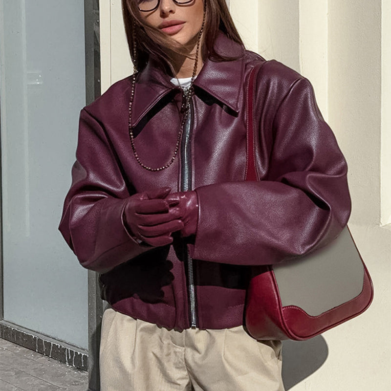 Solid color lapel jacket with zipper. Fashionable casual leather jacket with long sleeves. Women&