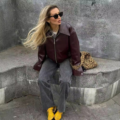 Solid color lapel jacket with zipper. Fashionable casual leather jacket with long sleeves. Women&