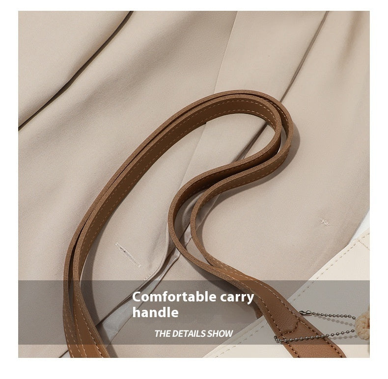 Large capacity shoulder bag made of genuine leather