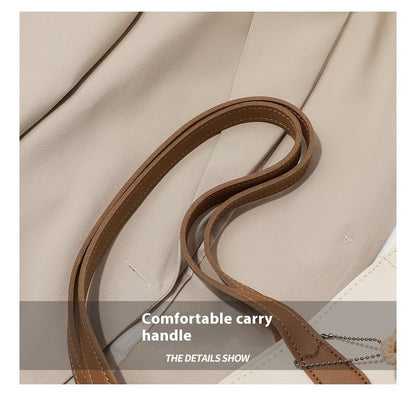 Large capacity shoulder bag made of genuine leather