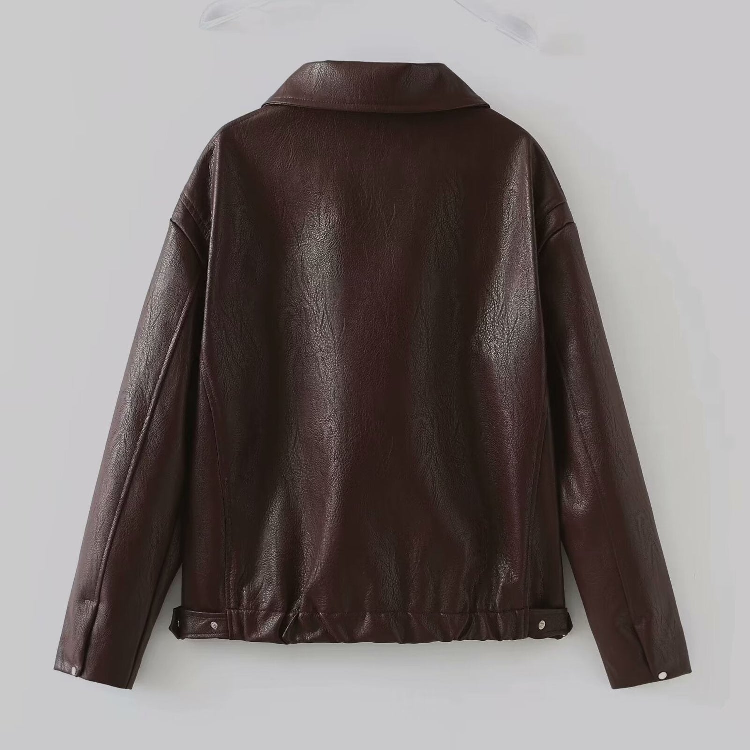 Solid color lapel jacket with zipper. Fashionable casual leather jacket with long sleeves. Women&