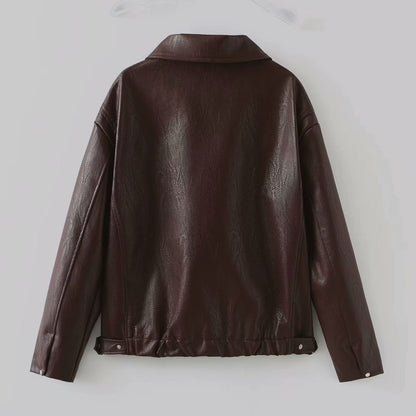 Solid color lapel jacket with zipper. Fashionable casual leather jacket with long sleeves. Women&