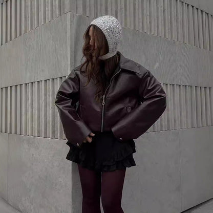 Solid color lapel jacket with zipper. Fashionable casual leather jacket with long sleeves. Women&