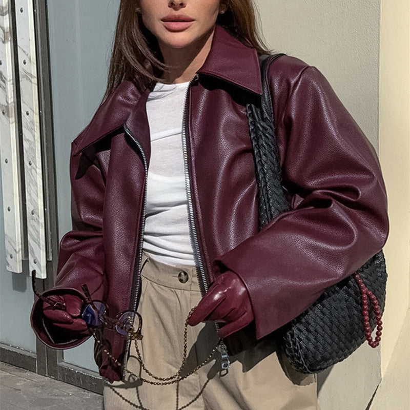 Solid color lapel jacket with zipper. Fashionable casual leather jacket with long sleeves. Women&