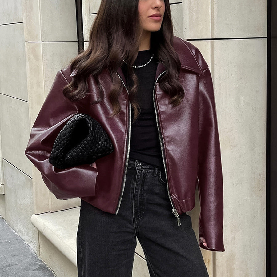 Solid color lapel jacket with zipper. Fashionable casual leather jacket with long sleeves. Women&